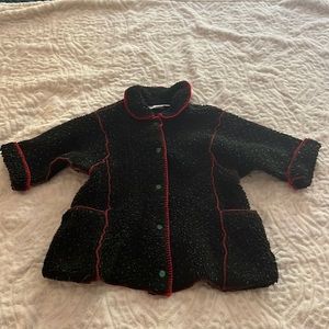 Toddler black fleece snap jacket.